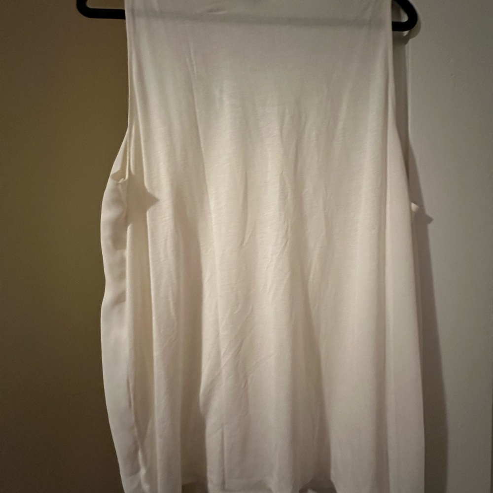 Ann Taylor Ivory sleeveless scoop neck tank top with a relaxed fit.